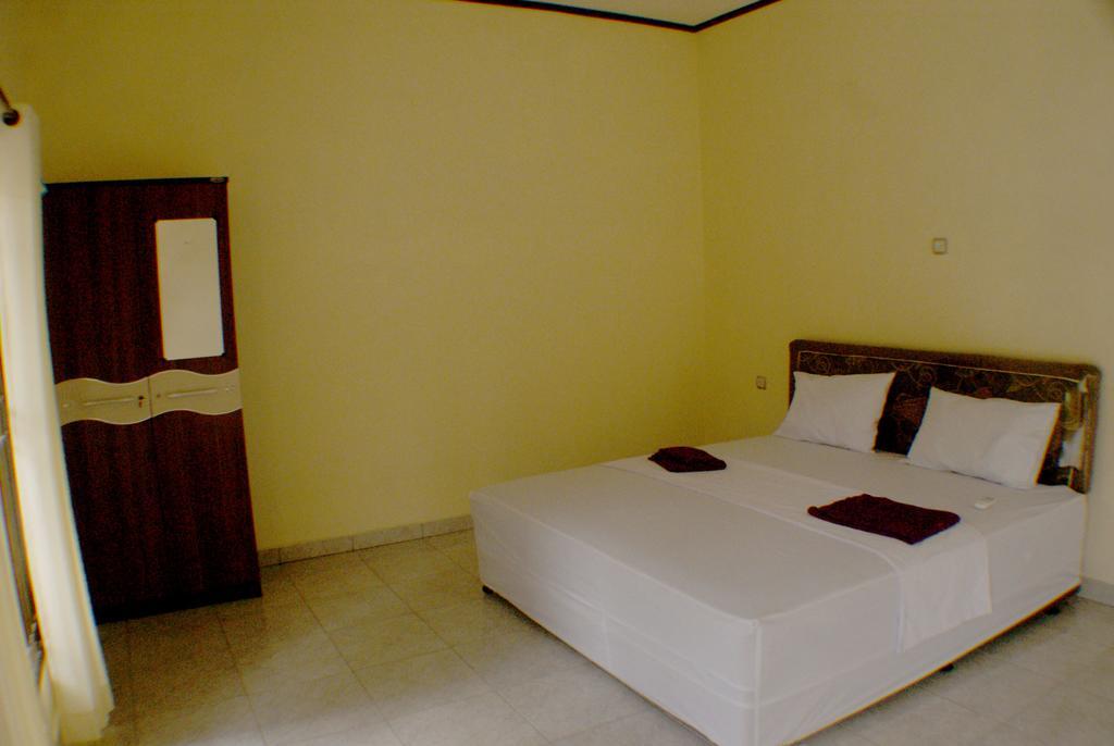 Herry Homestay Kuta  Quarto foto